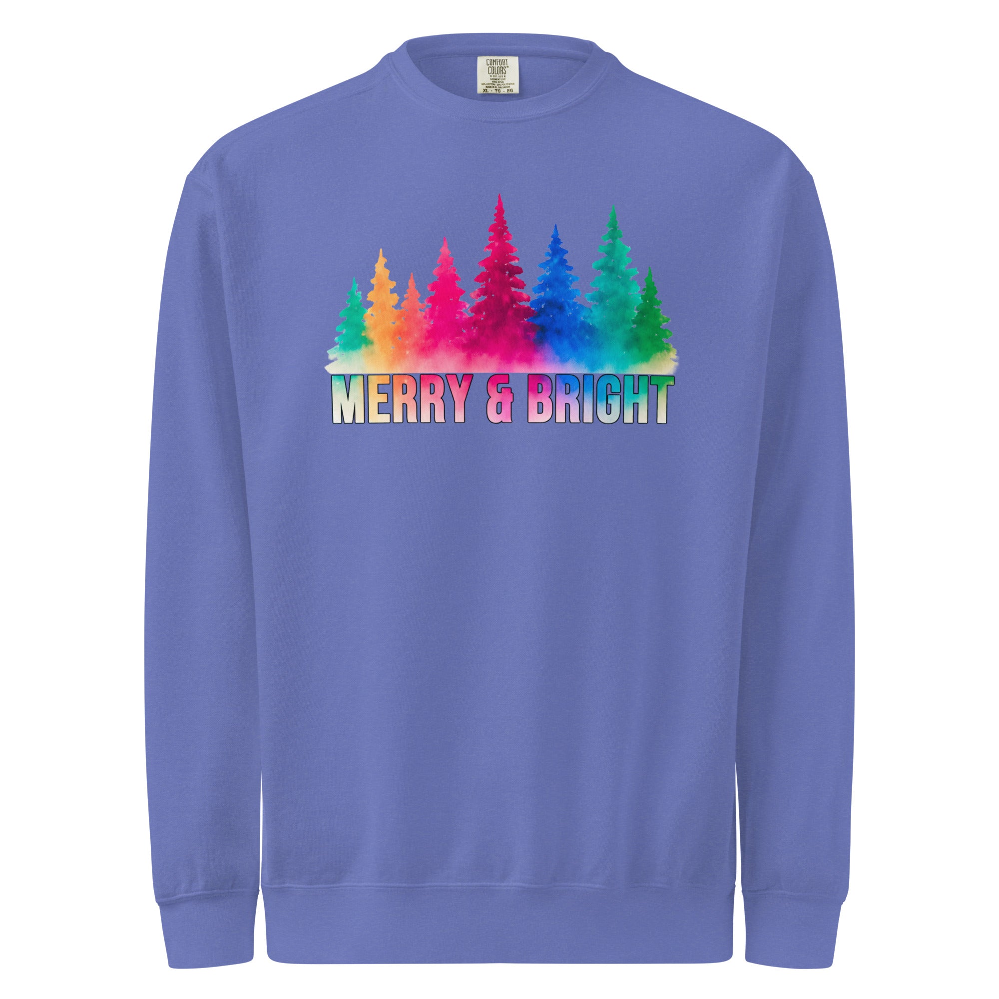 A purple sweatshirt with a graphic design featuring a line of colorful Christmas trees and the text "MERRY & BRIGHT" below them.