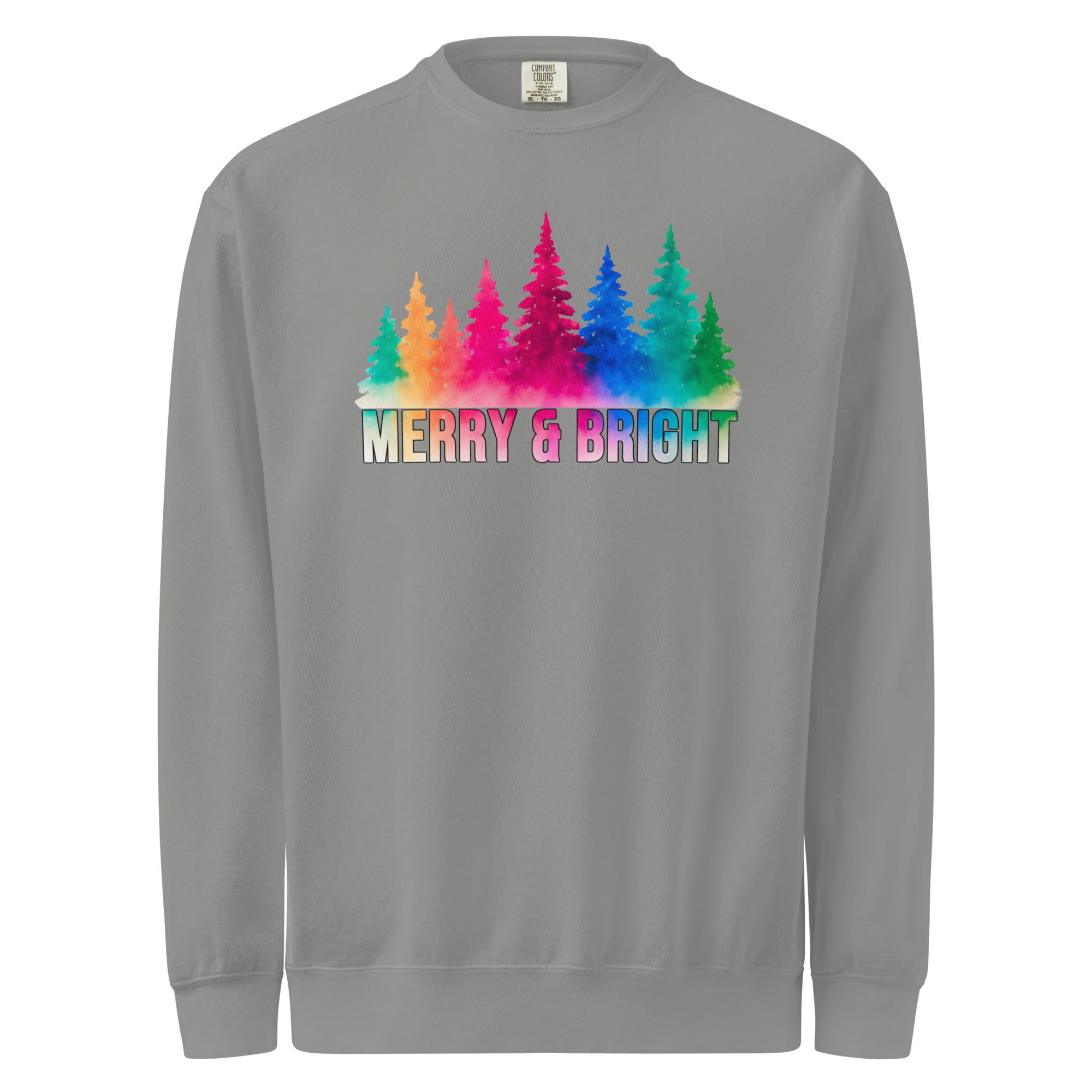 A gray sweatshirt with a graphic design featuring a line of colorful trees and the text "MERRY & BRIGHT" below them.