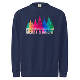 A navy blue sweatshirt with a graphic design featuring a line of colorful trees and the text "MERRY & BRIGHT" printed on it.