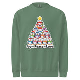 A green sweatshirt with a Christmas tree design made up of various cartoon penguins.
