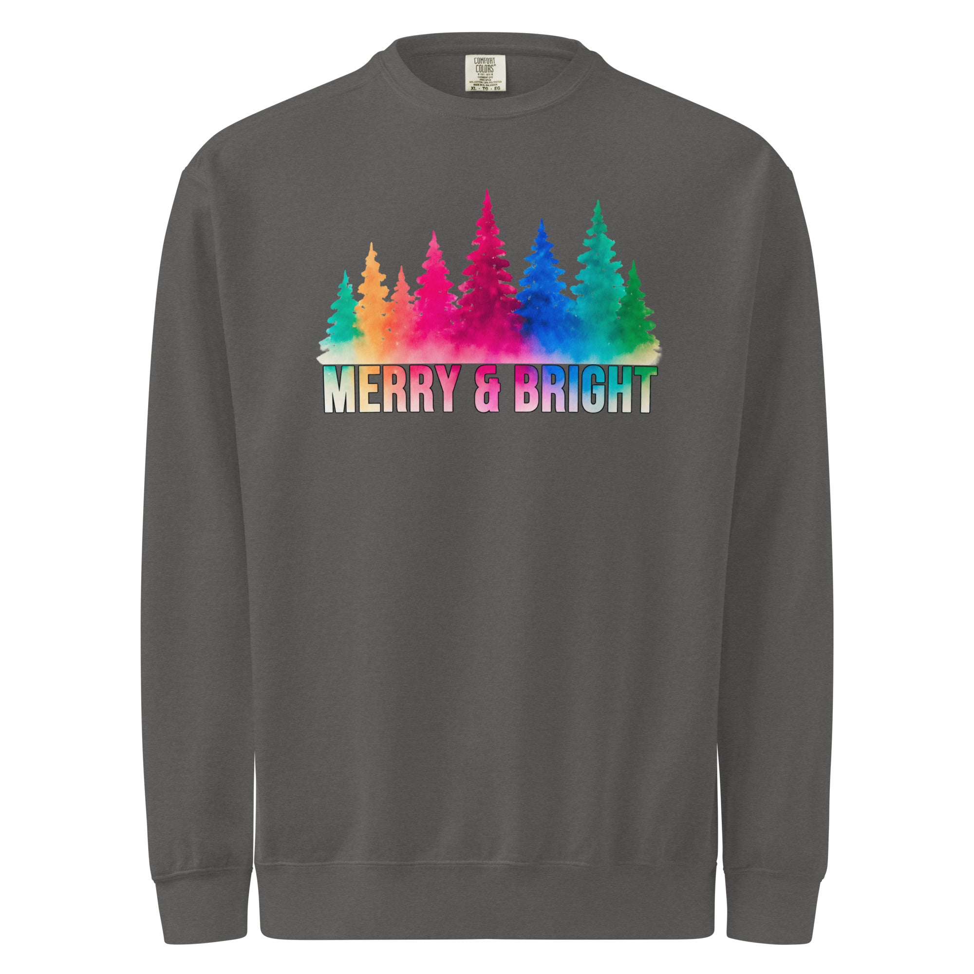 A gray sweatshirt with a graphic design featuring a line of colorful trees and the text "MERRY & BRIGHT" below them.