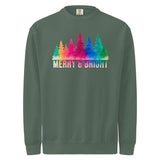 A green sweatshirt with a colorful graphic design featuring a line of trees in various shades of green, pink, blue, and orange, along with the text "MERRY & BRIGHT" printed on it.